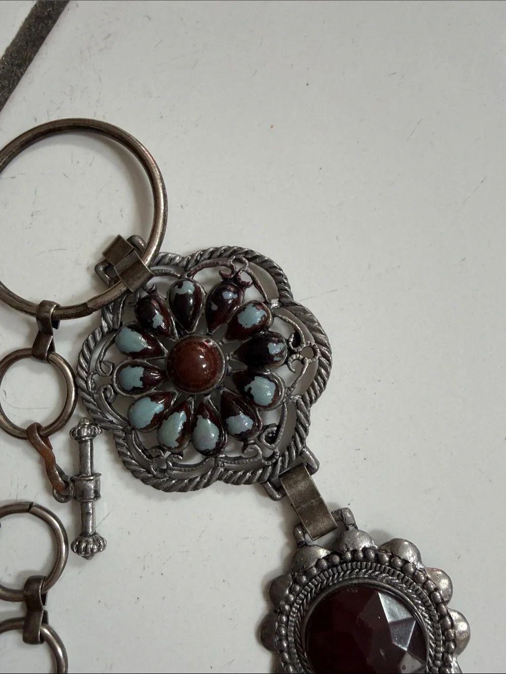 Silver tone Floral Link Belt with Garnet Accents